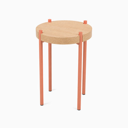 Minimalist Fern Plant Stand (White Oak) with a round solid hardwood top and sleek coral metal legs, perfect for organized stylish display.