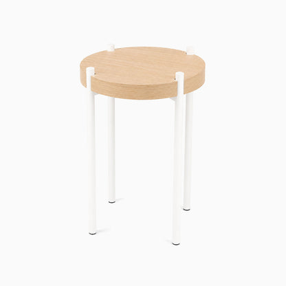 Minimalist Fern Plant Stand (White Oak) with durable white steel legs and solid hardwood round top, designed for functional and stylish display.