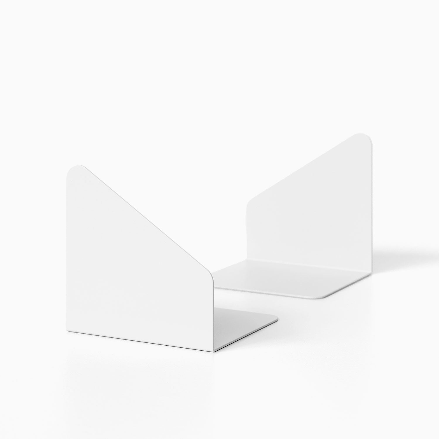 Geo Angle Bookend (Set of Two) in minimalist white metal design, sturdy and functional for organizing books on shelves or desks.
