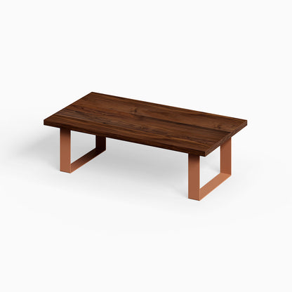 Good Point Coffee Table featuring a solid hardwood walnut top with minimalist metal legs in warm clay color, combining durability and modern style.