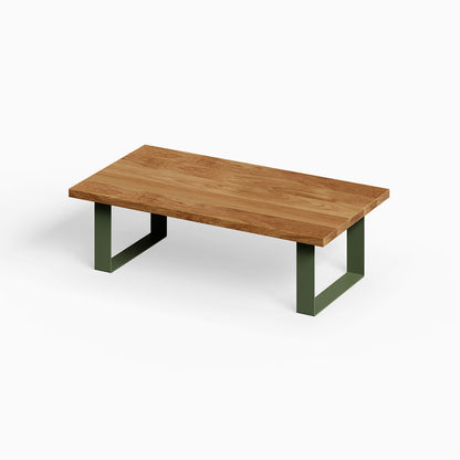 Good Point Coffee Table with a solid hardwood top and matte green metal legs, showcasing minimalist, functional American-made design.