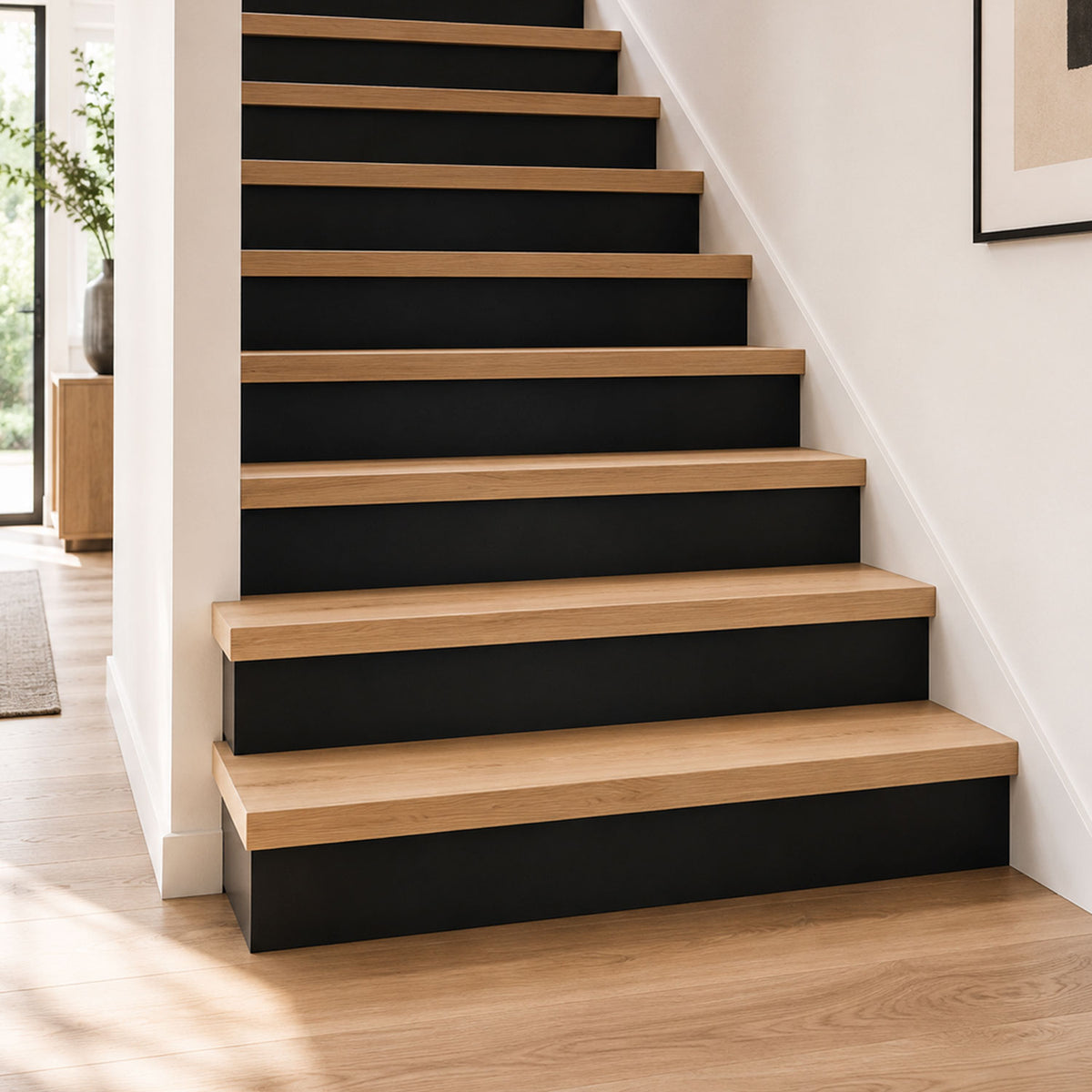 Good Step Solid Wood Stair Treads installed on a modern staircase with natural wood steps and contrasting black risers