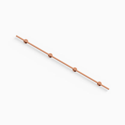 Grip Stair Rail shown as a long warm copper tone handrail with four round mounting brackets on a white background