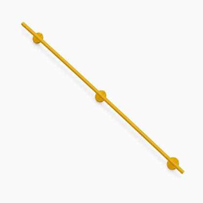 Grip Stair Rail in honey-colored finish designed for durable, functional wall support, maximizing space with minimalist American-made quality.
