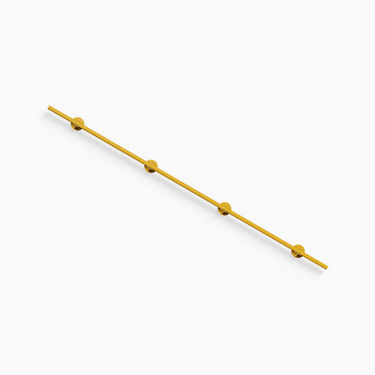 Grip Stair Rail in a gold finish with four round wall mounts for secure stairway support