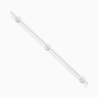Grip Stair Rail in sleek white finish made from durable rust-resistant steel, designed to maximize wall space and enhance safety with minimalist style.