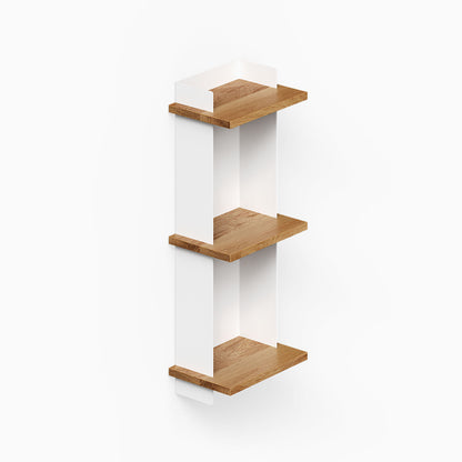 Halle Bookshelf with minimalist design featuring three white wall-mounted shelves with natural wood surfaces, combining function and style.