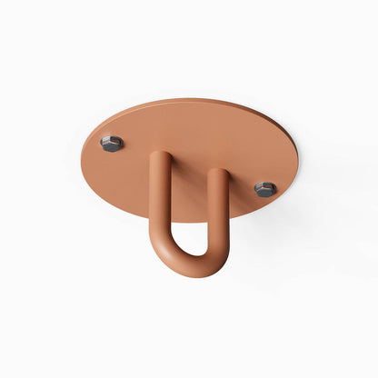 Hang On Ceiling Hook in rust-resistant steel with a minimalist design, ideal for organizing and maximizing wall space in any room.