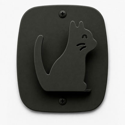 Kiddo Hooks wall hook in black metal shaped like a sitting cat, durable rust-resistant steel with minimalist design for functional wall organization.