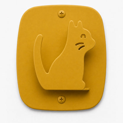 Kiddo Hooks wall hook in honey mustard color shaped like a cat, combining playful design with functional wall organization.