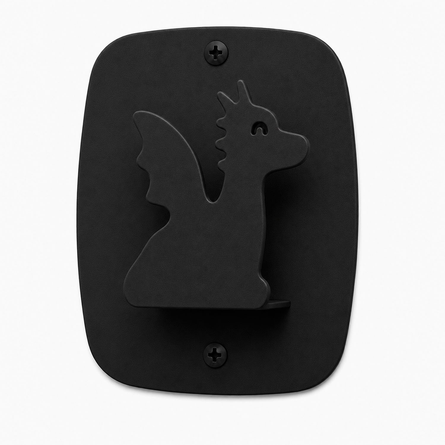 Kiddo Hooks wall hook in black, featuring a minimalist dragon design made from durable metal for playful and functional wall organization.