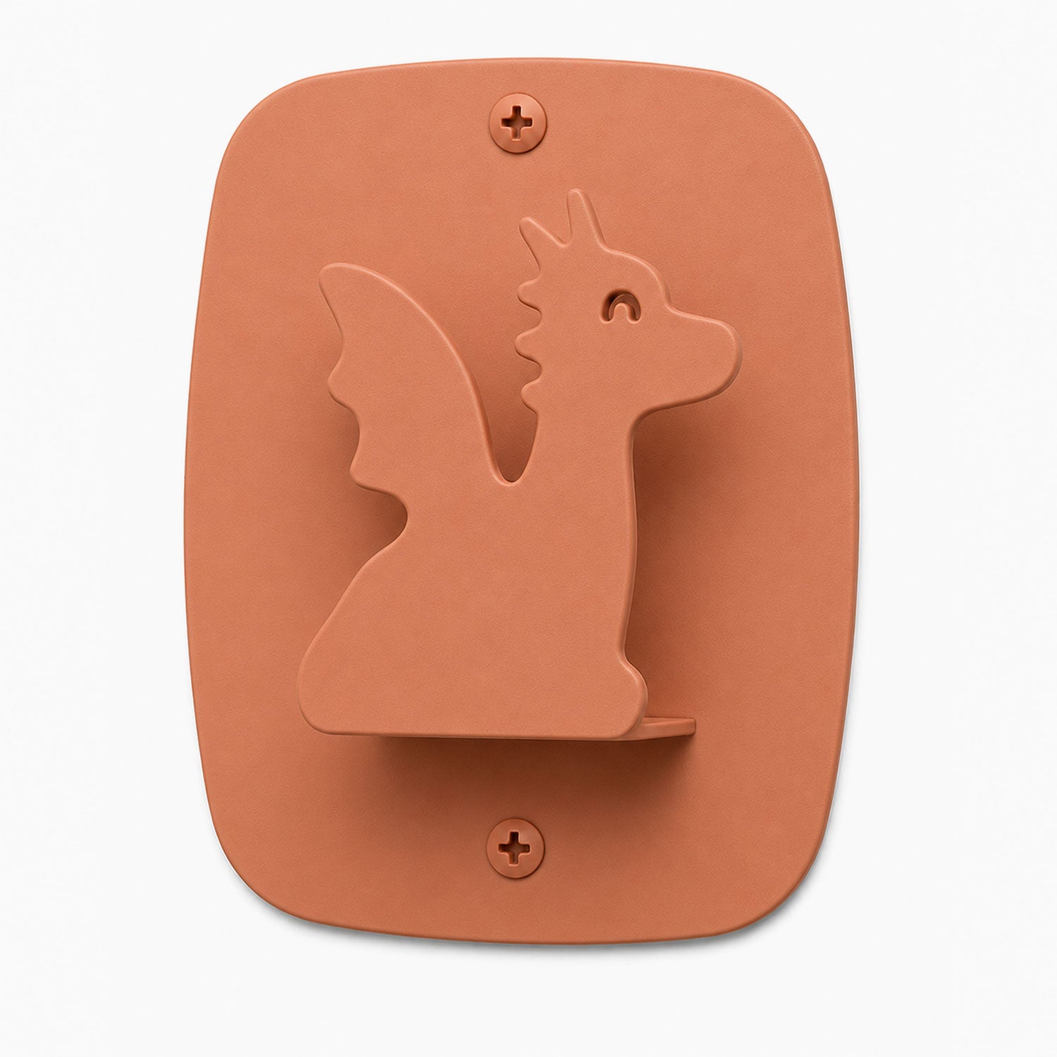 Kiddo Hooks in rust-colored clay with a dragon silhouette design, made from durable material to organize kids' rooms with playful wall hooks.