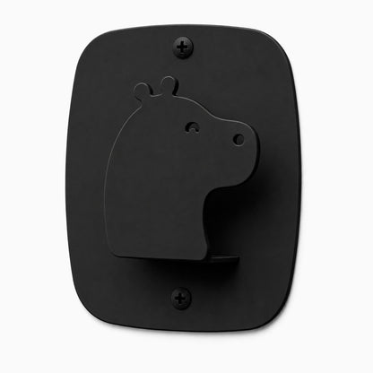Black metal wall hook shaped like a hippo head with a minimalist design, part of Kiddo Hooks for functional wall organization.