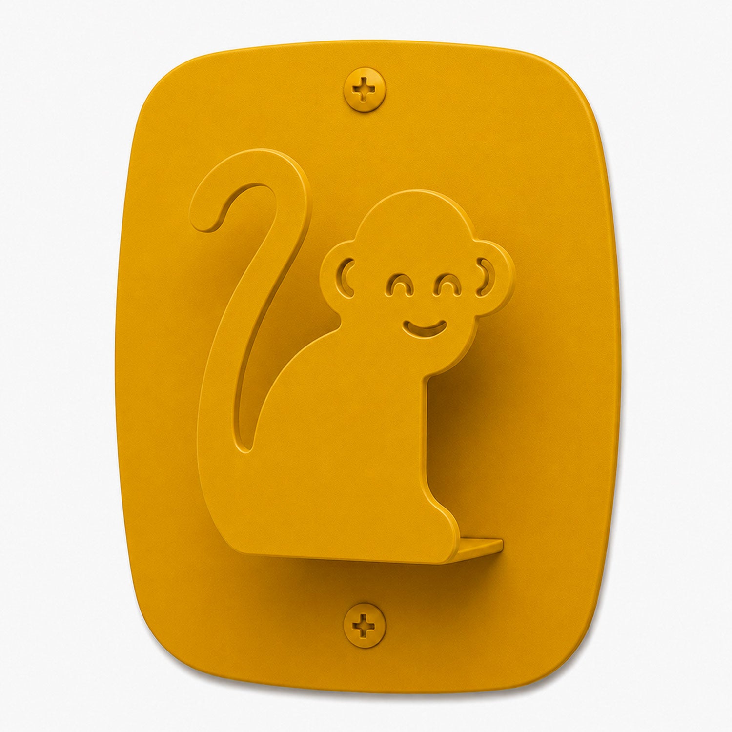 Kiddo Hooks wall hook in honey mustard color shaped like a smiling monkey, designed for functional and playful organization.