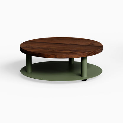 Ledger Coffee Table with round solid hardwood walnut top and matte army green steel base, minimalist design maximizing functional living space.