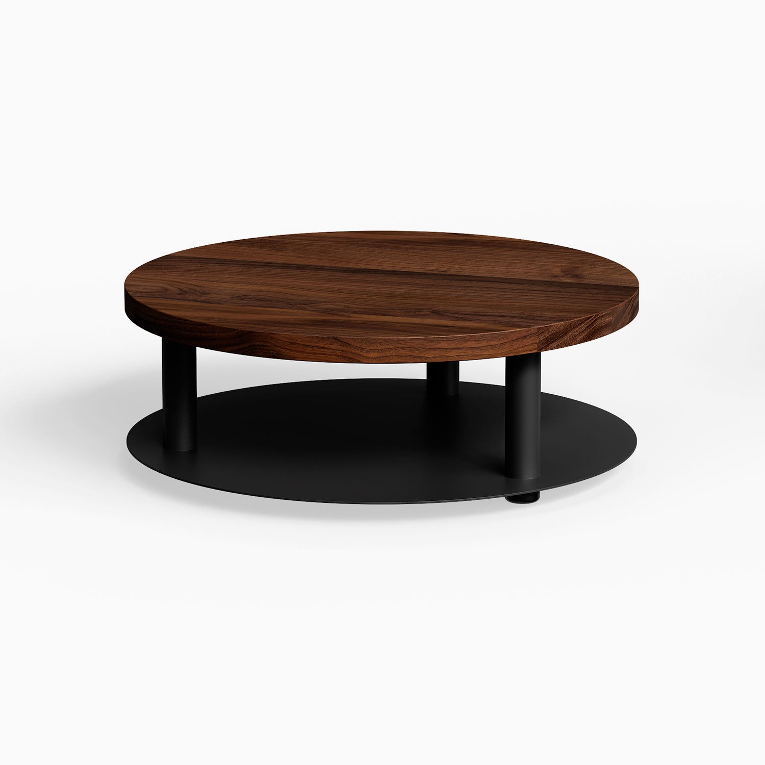 Ledger Coffee Table with a round solid walnut top and black metal base, featuring a minimalist design that maximizes style and function.
