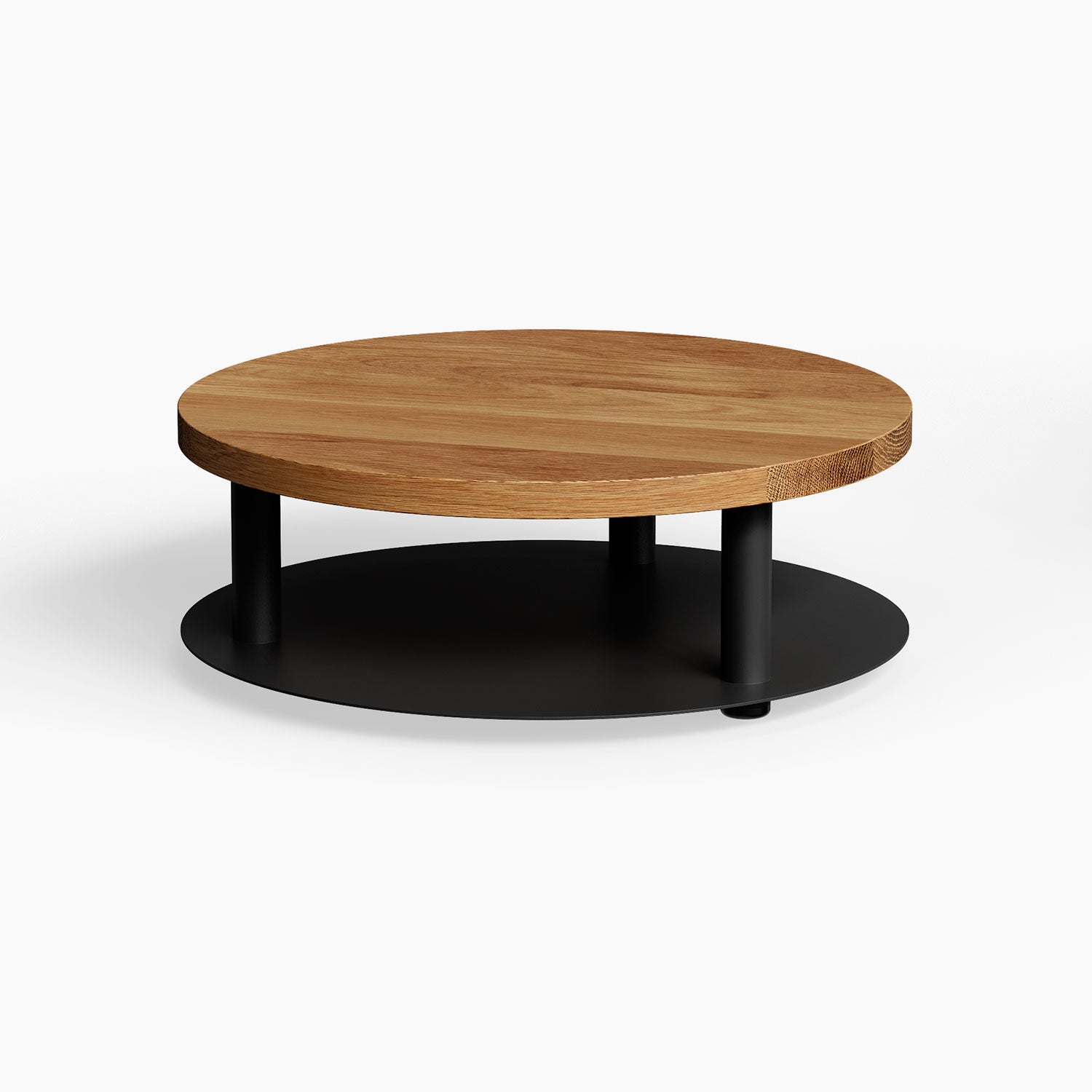 Ledger Coffee Table with a round solid hardwood top in white oak and a black metal base, showcasing a minimalist, functional design.