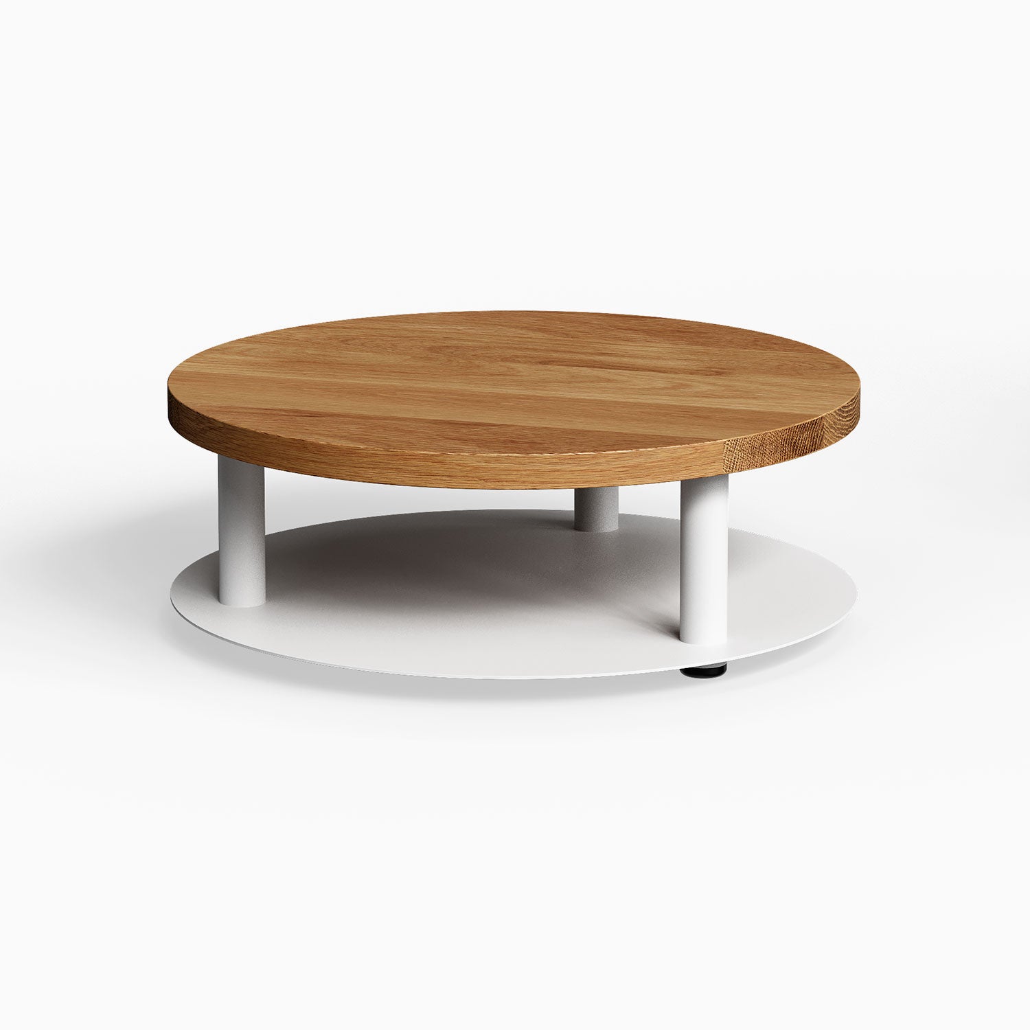 Ledger Coffee Table with a round solid hardwood top and white metal base, combining minimalist design and functional storage.