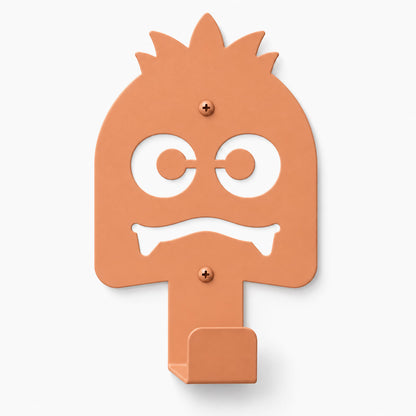 Little Hangups orange monster wall hook with a playful face for hanging coats bags and everyday accessories