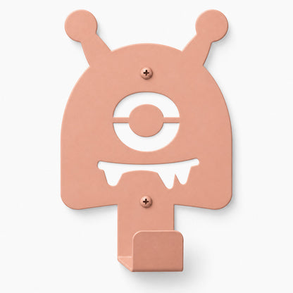 Little Hangups playful coral wall hook with a whimsical monster face for hanging coats bags or decor