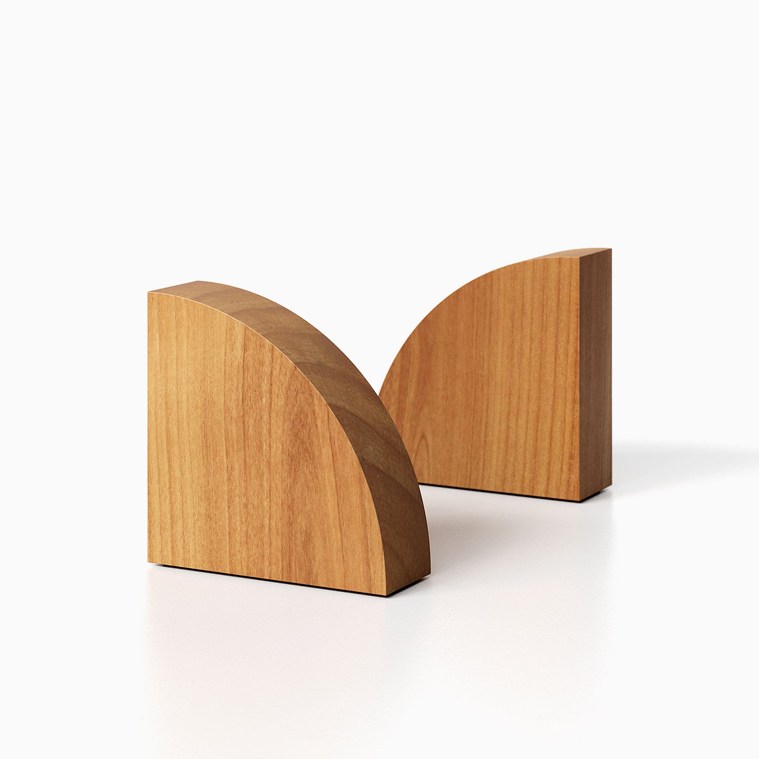 The Maggie Radius Product (Alder finish) pictured against a white background. Two bookends positioned in the center, one slightly off center, in front of the other.