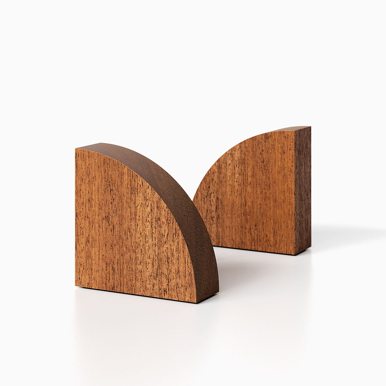 The Maggie Radius Product (mahogany finish) pictured against a white background. Two bookends positioned in the center, one slightly off center, in front of the other.