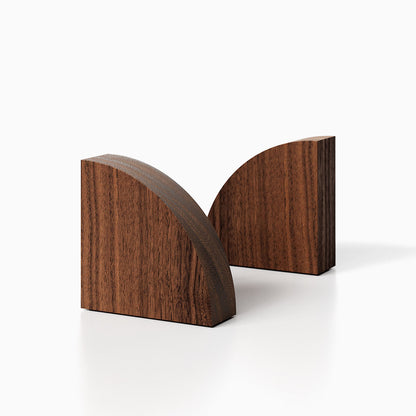 The Maggie Radius Product (Walnut finish) pictured against a white background. Two bookends positioned in the center, one slightly off center, in front of the other.