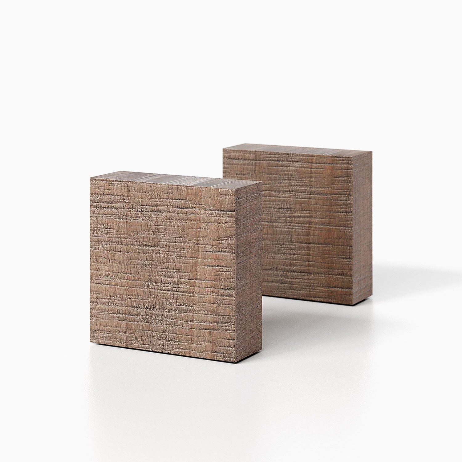 The Maggie Square Product (hatch grey rustic finish) pictured against a white background. Two bookends positioned in the center, one slightly off center, in front of the other.