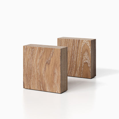 The Maggie Square Product (white oak glazed finish) pictured against a white background. Two bookends positioned in the center, one slightly off center, in front of the other.