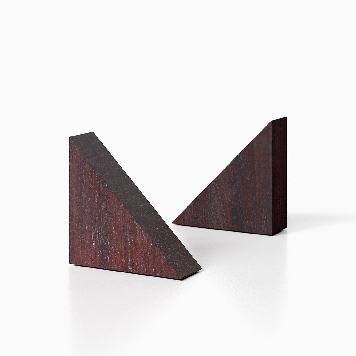 The Maggie triangle Product (dutch mocha finish) pictured against a white background. Two bookends positioned in the center, one slightly off center, in front of the other.