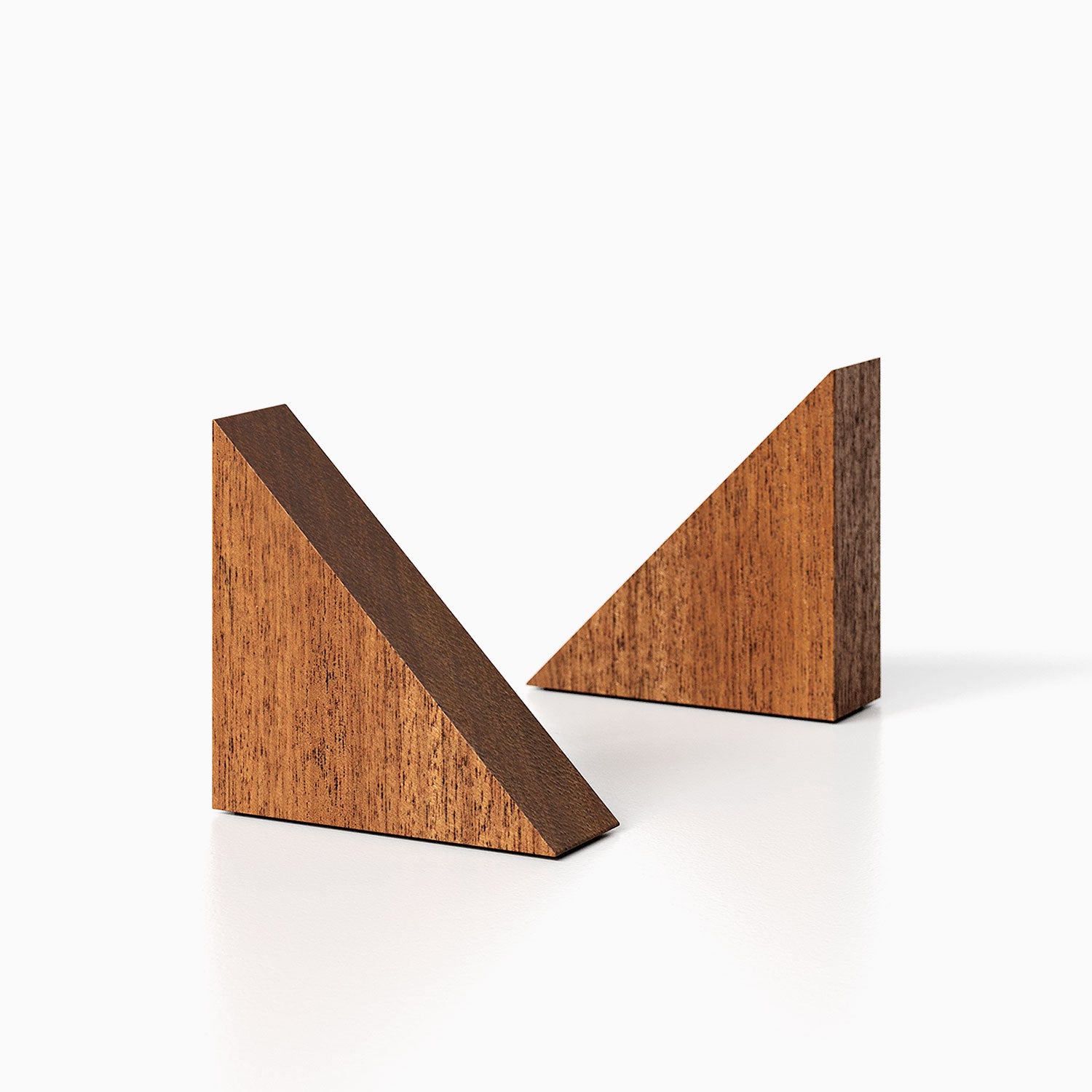 The Maggie triangle Product (mahogany finish) pictured against a white background. Two bookends positioned in the center, one slightly off center, in front of the other.