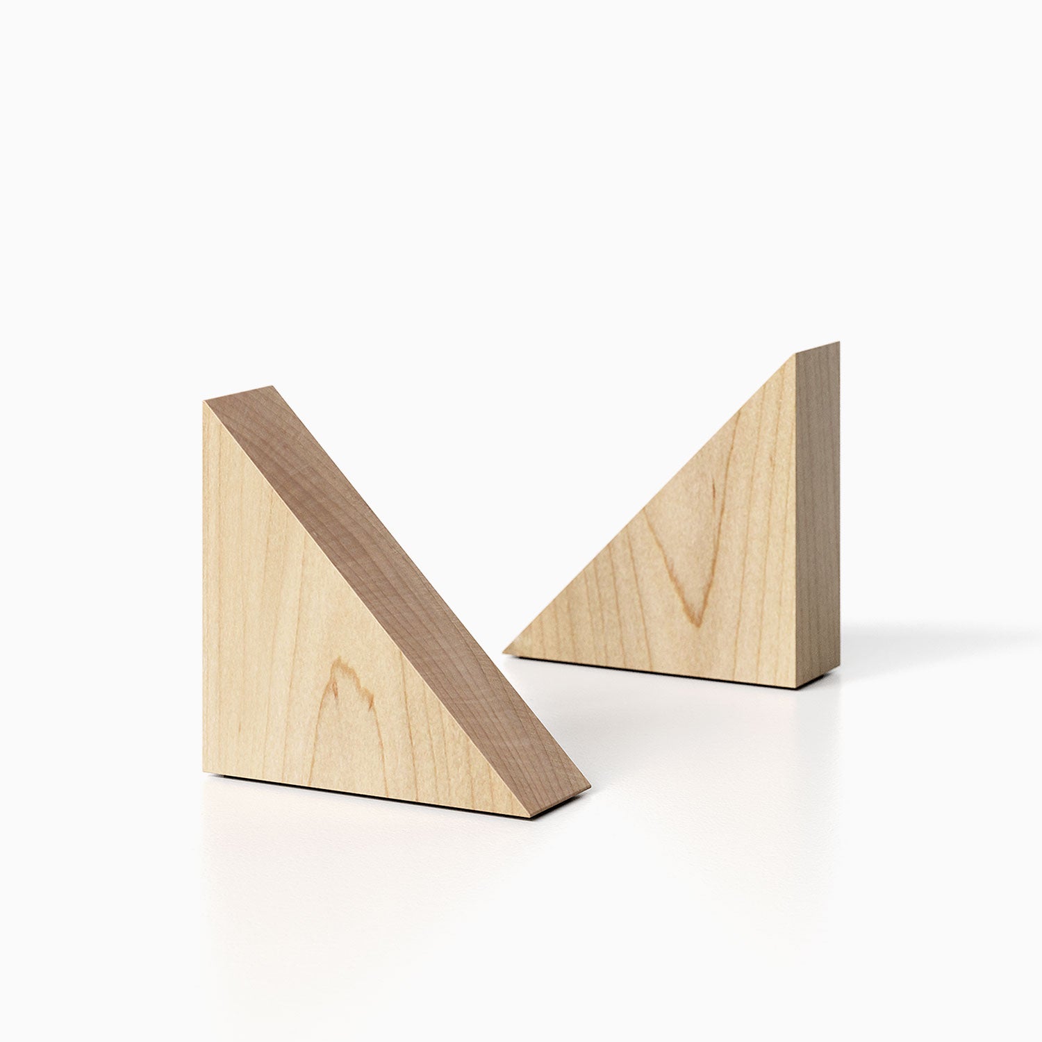 The Maggie triangle Product (maple finish) pictured against a white background. Two bookends positioned in the center, one slightly off center, in front of the other.