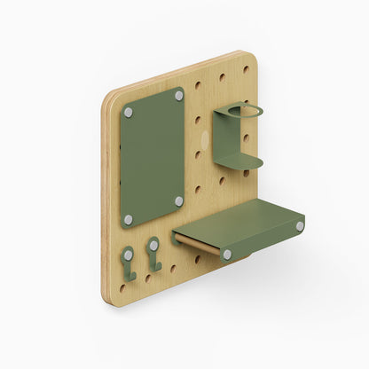 Morgan Put it There Pegboard Set in wood and green metal with various hooks, a small shelf, and a holder for organized wall display and storage
