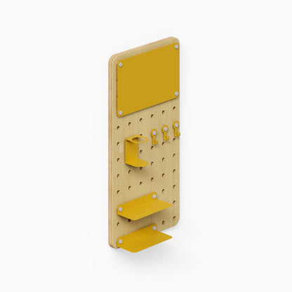 Morgan Room to Grow pegboard Set with natural wood panel and mustard yellow metal shelves and hooks for organizing and displaying items.