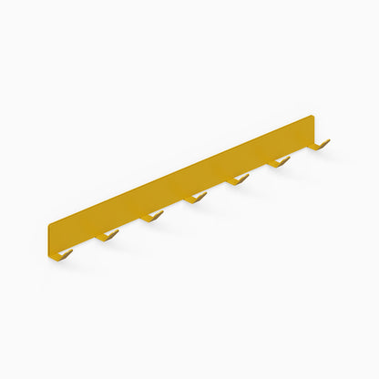 Of Course Wall Hook in mustard yellow metal with seven hooks, designed for minimalist, functional wall organization and display.