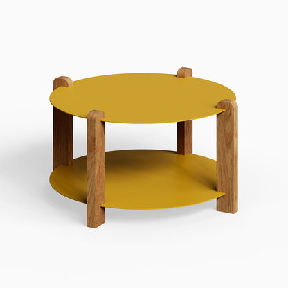 Otis Round Coffee Table with a minimalist design featuring honey mustard mixed-material round surfaces and solid hardwood legs for modern living spaces.