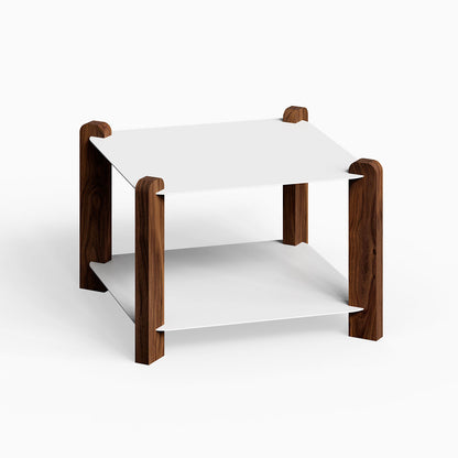 Hugo Square Coffee Table with minimalist white metal surfaces and solid walnut wood legs, blending functional design with modern style.