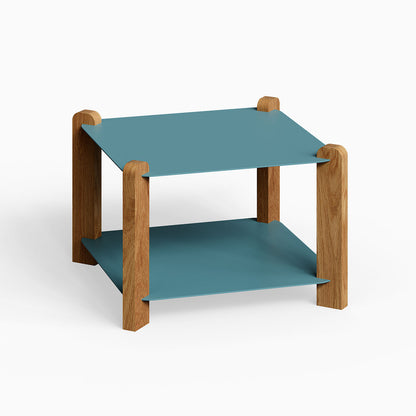 Hugo Square Coffee Table with a minimalist blue steel top and shelf supported by solid oak legs, perfect for stylish organization and display.