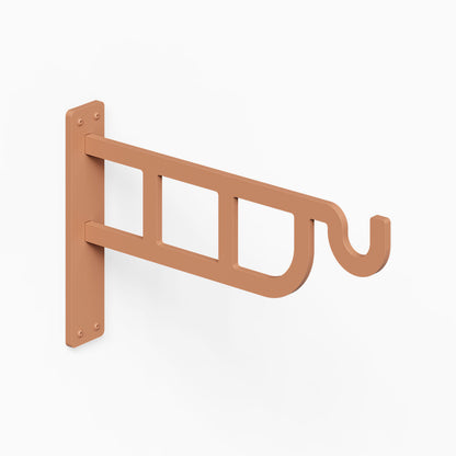 Petal Outdoor Planter Hook with wall mount plate and curved hook for hanging outdoor planters in a warm metallic finish