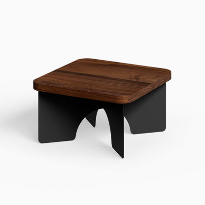 Ledger Coffee Table with a rich walnut wood top and sleek black steel legs combining minimalist design and durable craftsmanship.