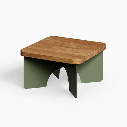 Ledger Coffee Table with a solid hardwood top and army green steel base, combining minimalist design with durable American-made materials.