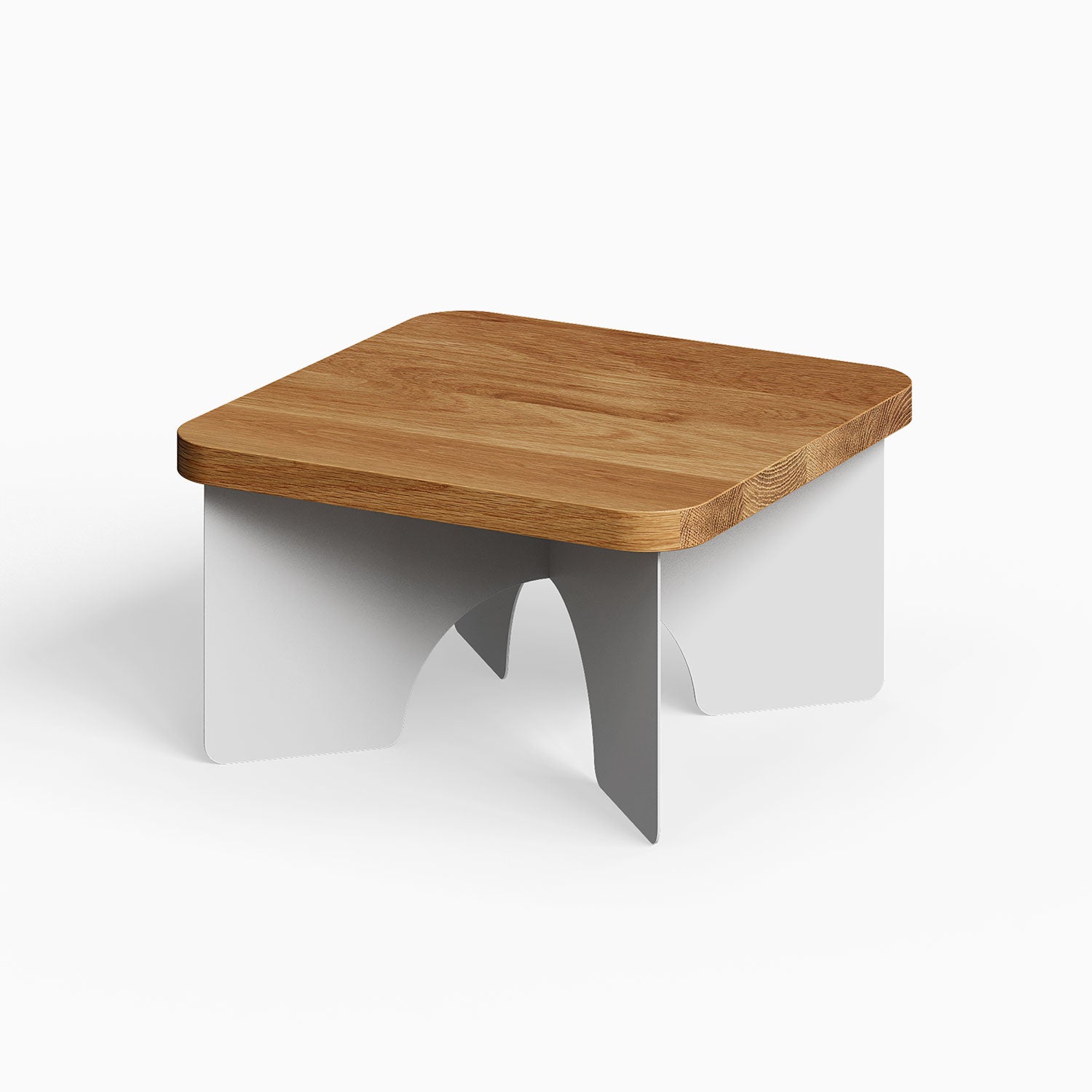 Ledger Coffee Table with a solid hardwood top and minimalist white steel base, combining functionality and modern design for versatile living spaces.