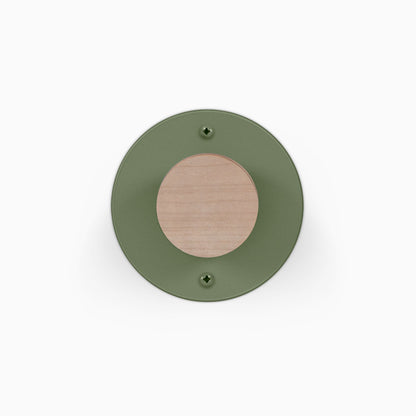 Runda Coat Rack 1 round green wall hook with a natural wood center for minimalist coat and accessory organization