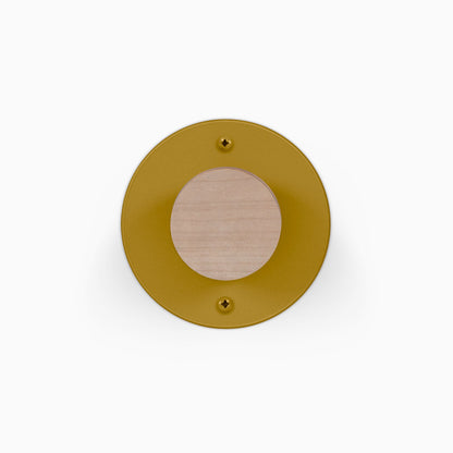 Runda Coat Rack 1 round gold wall hook with a natural wood center for minimalist entryway organization