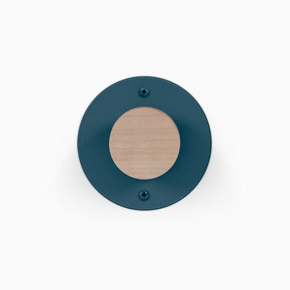 Runda Coat Rack 1 with a round teal wall plate and light wood center hook for minimalist wall organization