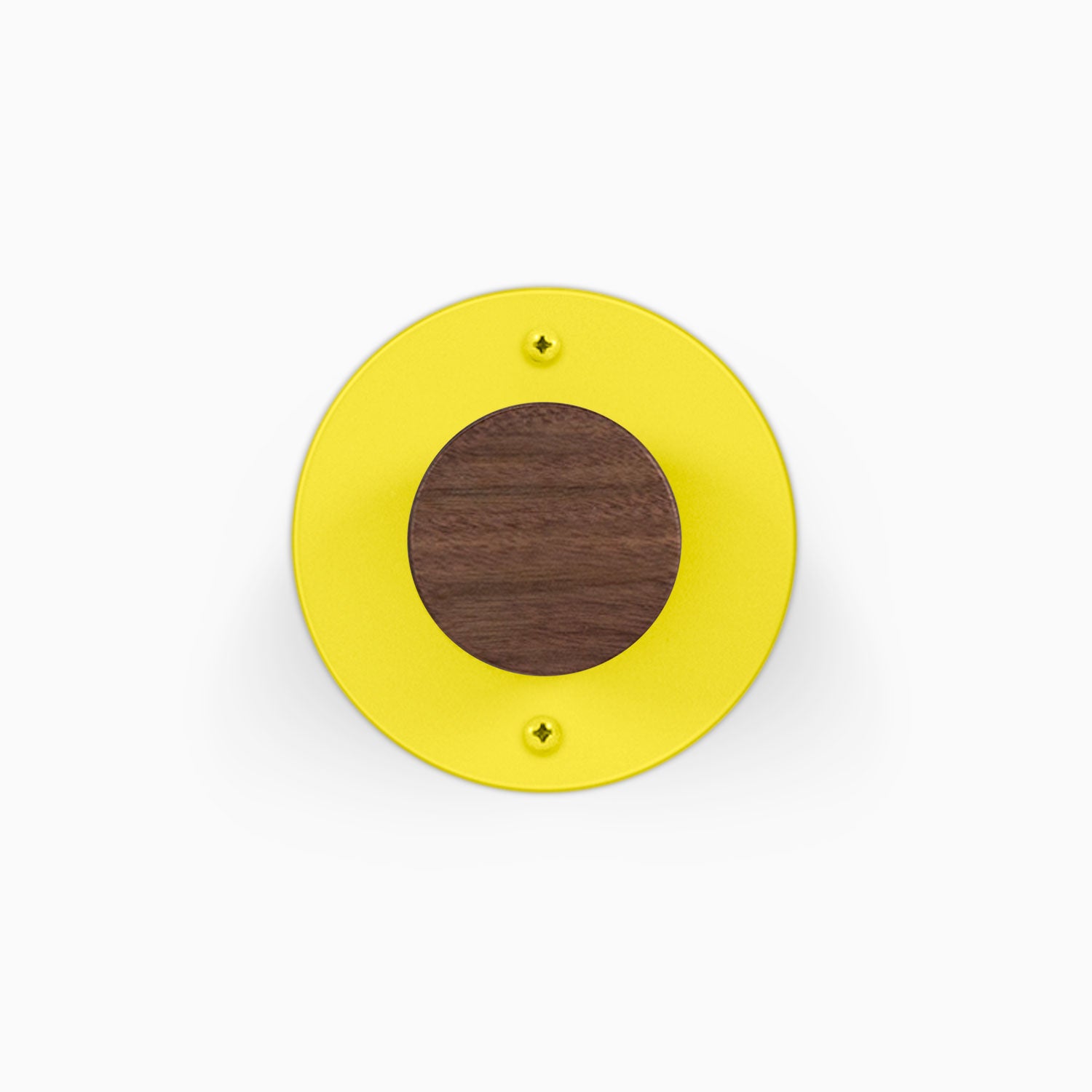 Runda Coat Rack 1 yellow circular wall hook with a walnut wood center and visible mounting screws for organized wall storage