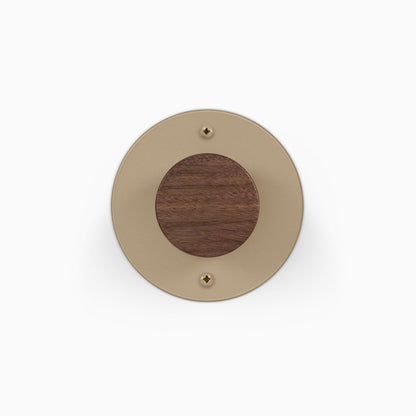 Runda Coat Rack 1 round wall hook with a warm metal plate and solid wood center for organized wall storage