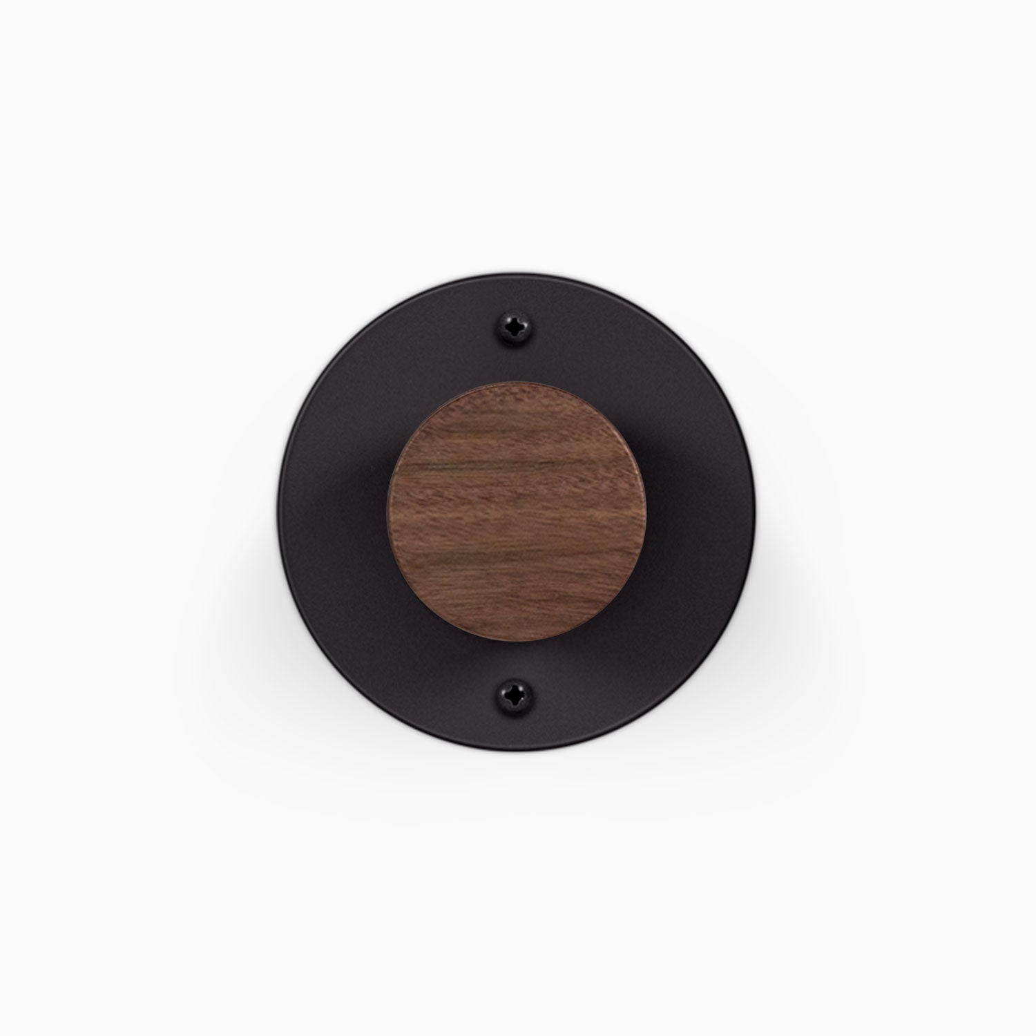 Runda Coat Rack 1 round black wall mounted coat hook with a walnut wood accent and visible mounting screws