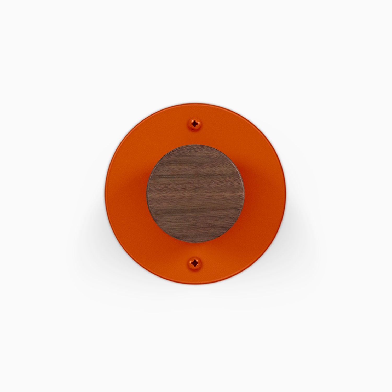 Runda Coat Rack 1 orange circular wall mounted rack with a round wood accent and two visible mounting screws