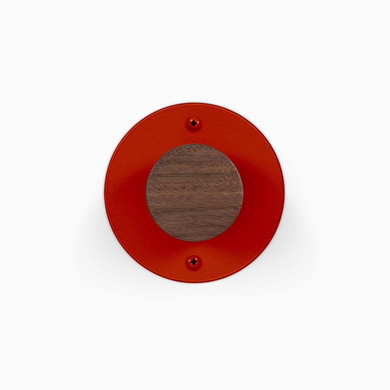 Runda Coat Rack 1 red circular wall hook with a wood center and two visible mounting screws for organized entryways